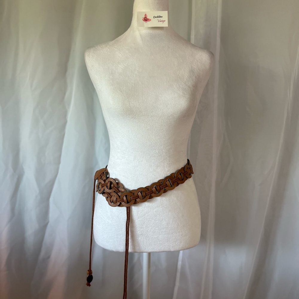 An Early 2000s Brown Braided Tassel Belt